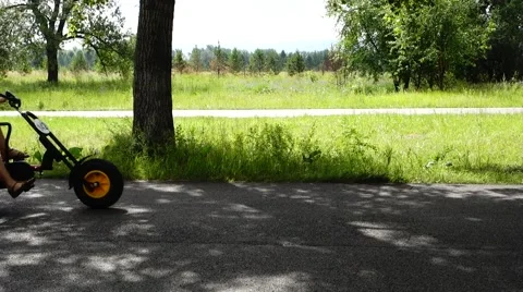Riding on the bike path in the Park Stock Footage 52596739
