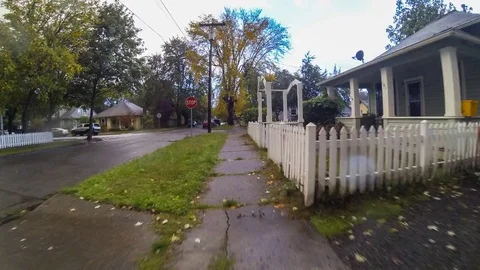 Riding bike through town Stock Footage 80986115