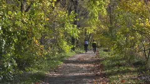 Riding Bikes In Autumn Stock Footage 10795149