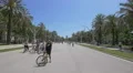 Riding bikes on Passeig de Lluis Companys, Barcelona 4k or 4k+ Resolution