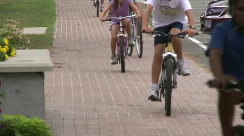 Riding bikes through town (6 of 7) Video stock 16706282