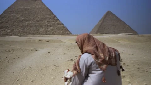 Riding A Camel At The Pyramids Of Giza In Egypt Stock Footage 158075811