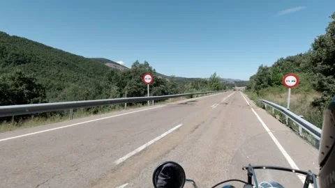 Riding a classic custom motorcycle on an asphalt road, riding a motorcycle Stock Footage 254707676