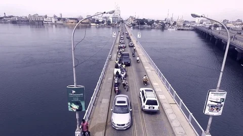 Riding on Cotonou's bridge Stock Footage 81126703