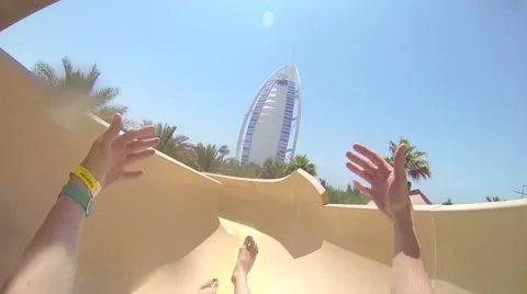 Riding a crazy fun waterslide point of view GoPro footage in Dubai water park Video stock 61004385