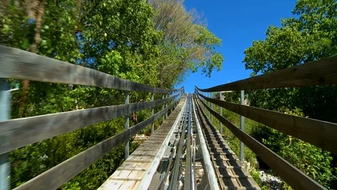 Riding on a Dragon Coaster Stock Footage 99117681