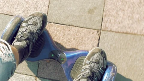 Riding electric hoverboard self balancing scooter Stock Footage 91142454