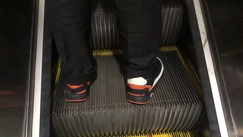 Riding an escalator in a multi-storey building Stock Footage 306758766