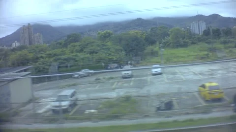 Riding fast moving forward on sky metro train view of ghetto slum old dirty  Stock Footage 204459062