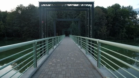 Riding on footbridge Stock Footage 94351683