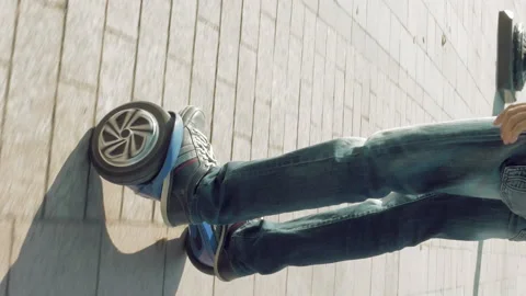 Riding hoverboard or self balancing gyro scooter Stock Footage 91142422