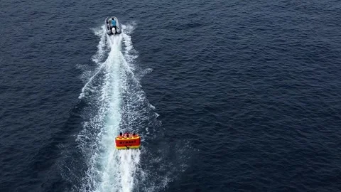 Riding on an inflatable sofa, extreme water riding Stock Footage 280083319