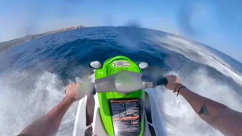 Riding a Jet ski fast jumping ocean waves POV jetski Stock Footage 102672198
