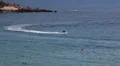 Riding in jet ski in Mediterranean sea in Coral Bay resort, Paphos, Cyprus HD Footage