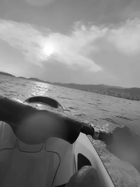 Riding a Jet Ski on Open Water at Sunset Vídeos de archivo 341318646