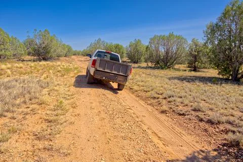 Riding off kilter on Hell Point Road AZ. Stock Photos