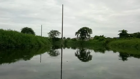 Riding long tail boat on local canal, Bangkok, Thailand Video stock 248051996