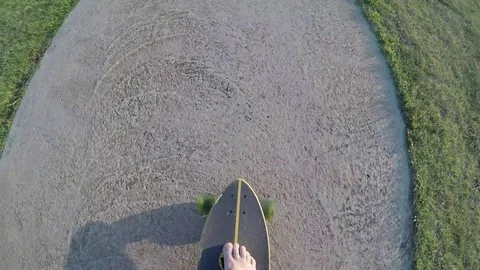 Riding on longboard barefoot Stock Footage 78166047