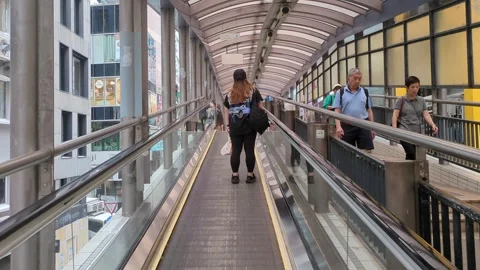 Riding the Mid Level escalator in Hong Kong Central Stock Footage 271192041