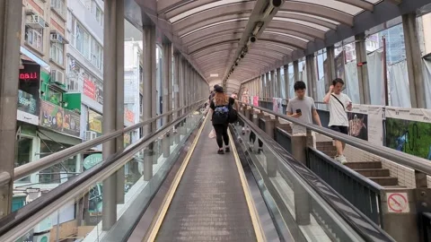 Riding the Mid Level escalator in Hong Kong Central Stock Footage 271192056