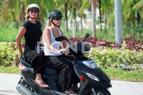 Riding motorbike Stock Photos