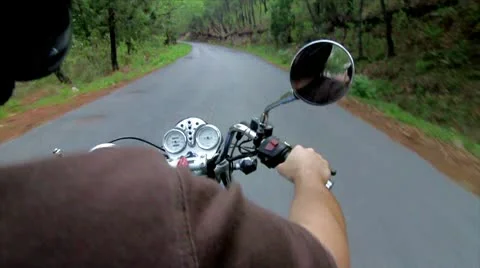 Riding Motorcycle in natural park Stock Footage 10573509