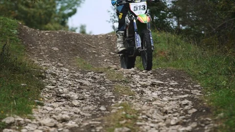 Riding on motorcycle through the rocks 4k Stock-Footage 89596864