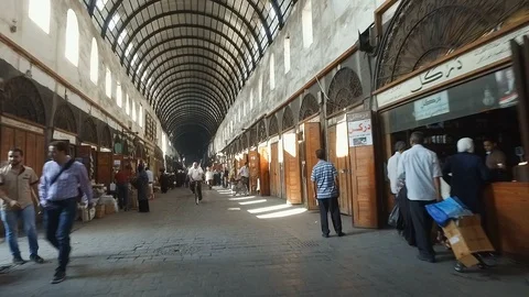 Riding a motorcyle through big bazaar in Old Damascus, Syria Stock Footage 119505993