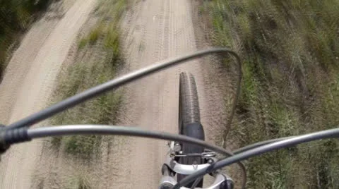Riding a mountain bike Stock Footage 26298385