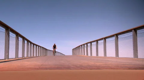 Riding my bicycle on a deck bridge. Stock Footage 728086