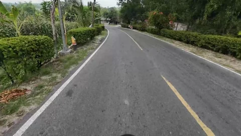 Riding passing through the small road in Central Java, Indonesia 動画素材 316877343