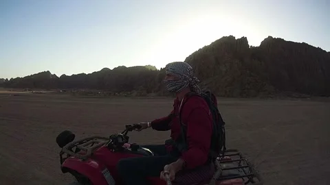 Riding on Quad Bikes in the Desert of Egypt Stock Footage 266497789