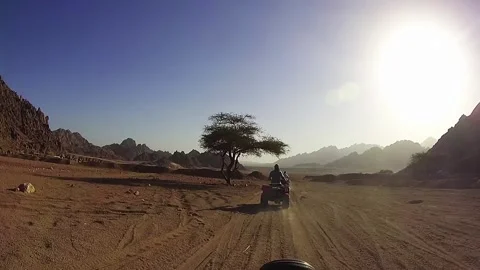 Riding on Quad Bikes in the Desert of Egypt Stock Footage 272267074
