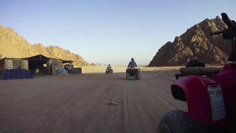 Riding on Quad Bikes in the Desert of Egypt Stock Footage 272267250