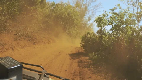 Riding quad cycle on a steep hill in dusty cloud. Pov footage of ATV ride Stock Footage 276403913