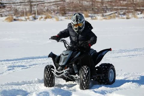 Riding a Quad in the Winter Stock Photos