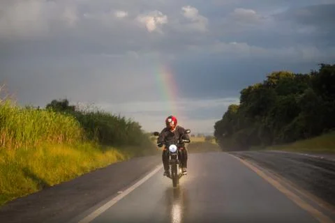 Riding in the rainbow Stock Photos