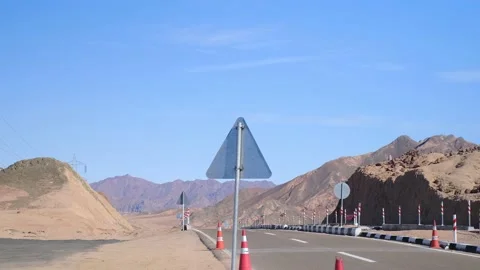 Riding a road through the desert and mountains in Egypt Stock Footage 236571023