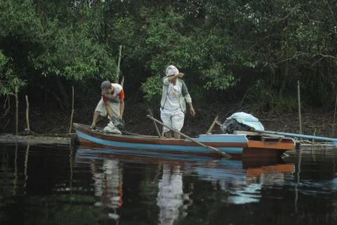 Riding a rowboat 2 Stock Photos