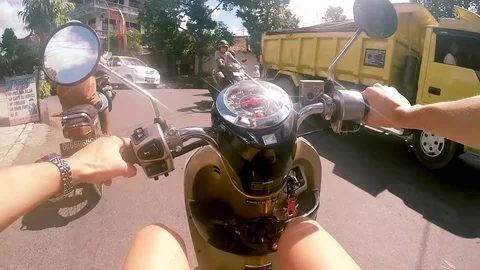 Riding on scooter in Bali Stock Footage 74134081