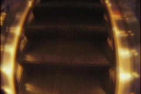 Riding shiny escalator Stock Footage 112853