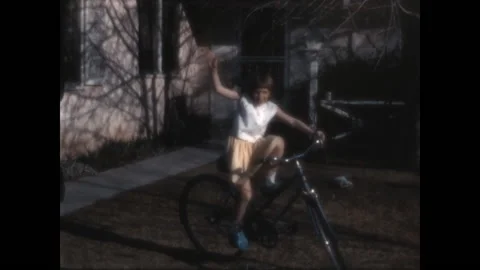 Riding on the Sidewalk 1966 Stock Footage 211885417