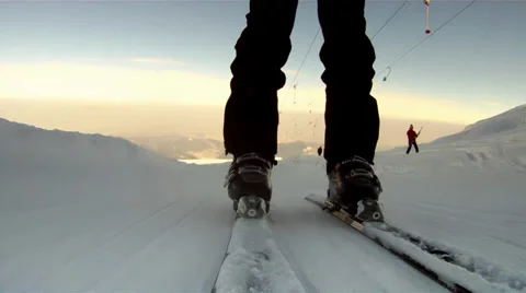 Riding a ski lift Видео 33302199
