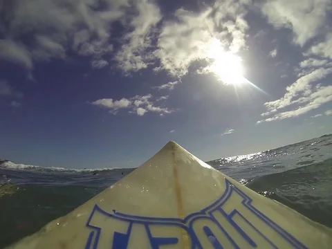 Riding surfboard Stock Footage 77047051