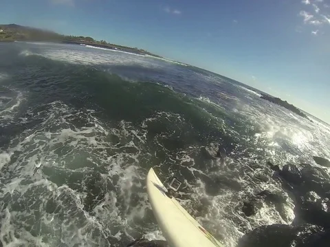 Riding surfboard Stock Footage 77047056