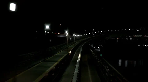 Riding train at night with lights on track Stock-Footage 1138872