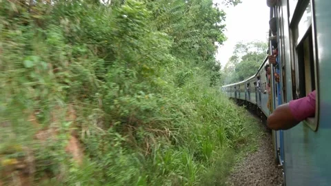 Riding on a train in Sri Lanka Stock Footage 234727792