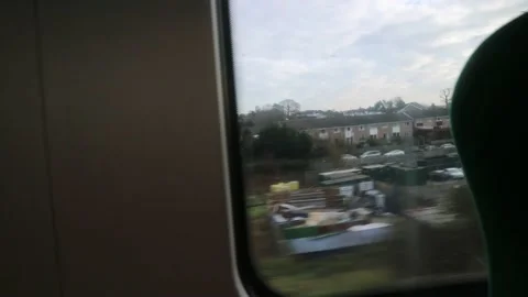 Riding on a train in the UK , view from the inside of the train - England Stock Footage 139282539