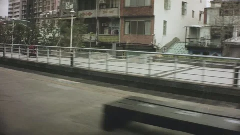 Riding on train view of arriving old antique train station with sign says Shanji Stock-Footage 237251682