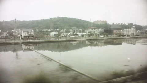 Riding on train view of construction factory storage residential neighborhood bu Video stock 237251838